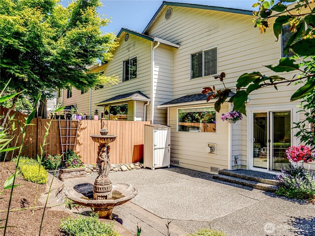 18808 19th Dr SE, Bothell, WA 98012 - rear view of house with a patio area