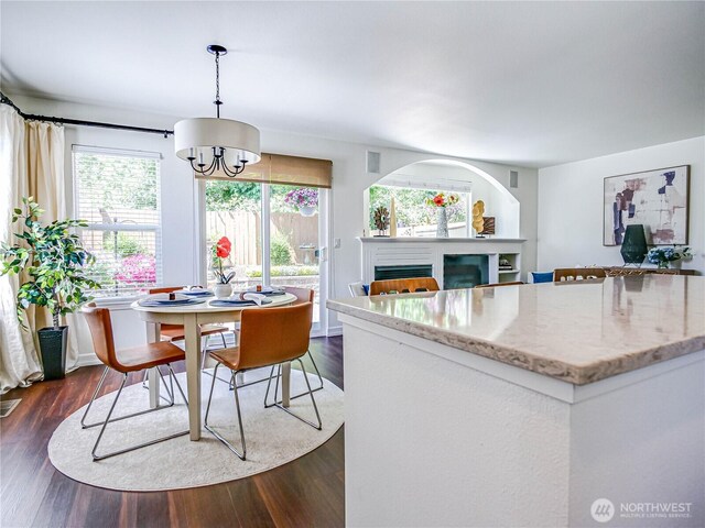 18808 19th Dr SE, Bothell, WA 98012 - dining room featuring plenty of natural light, a chandelier, and dark wood-style flooring