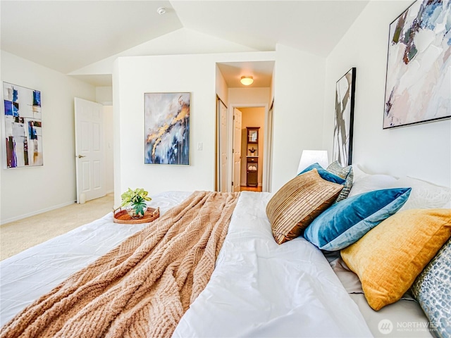 18808 19th Dr SE, Bothell, WA 98012 - carpeted bedroom featuring vaulted ceiling and baseboards