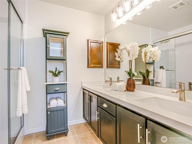 18808 19th Dr SE, Bothell, WA 98012 - full bath with double vanity, tile patterned floors, and a shower stall
