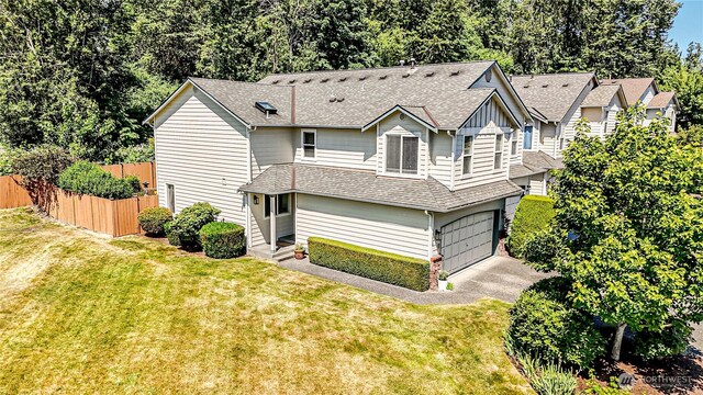 18808 19th Dr SE, Bothell, WA 98012 - view of front of home featuring driveway, roof with shingles, and a garage