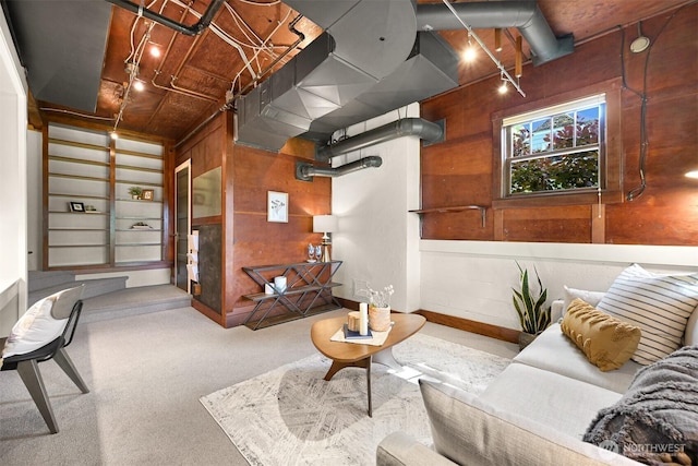 251 N Garden St, Bellingham, WA 98225 - carpeted living room featuring wooden walls