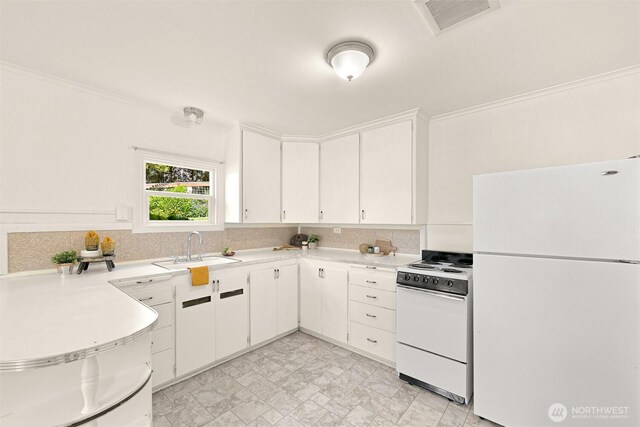 251 N Garden St, Bellingham, WA 98225 - kitchen with white appliances, light countertops, and decorative backsplash