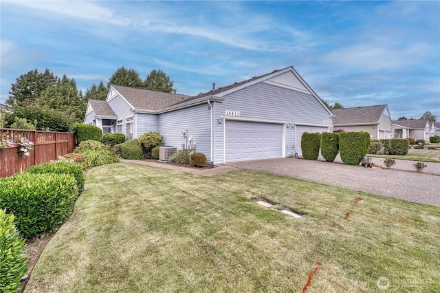 14413 Riverwalk Dr, Sumner, WA 98390 - view of front of house featuring driveway and a garage