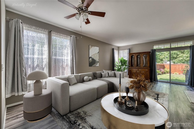 14413 Riverwalk Dr, Sumner, WA 98390 - living room with wood finished floors, healthy amount of natural light, and a ceiling fan