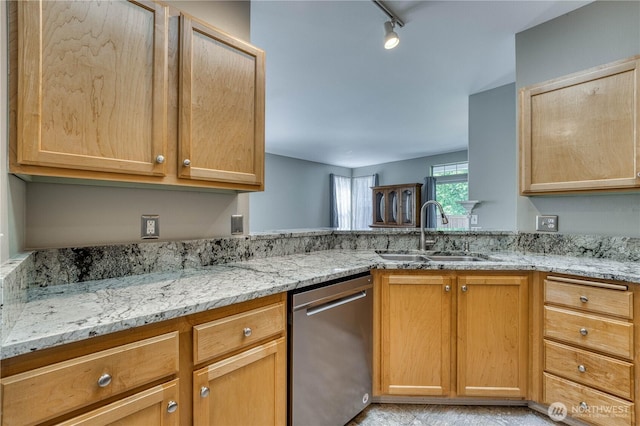 14413 Riverwalk Dr, Sumner, WA 98390 - kitchen featuring stainless steel dishwasher, light stone counters, rail lighting, and light brown cabinets