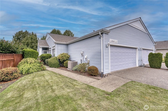 14413 Riverwalk Dr, Sumner, WA 98390 - view of side of property featuring driveway and an attached garage