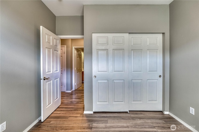 14413 Riverwalk Dr, Sumner, WA 98390 - unfurnished bedroom with wood finished floors and a closet