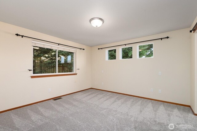 3706 54th St E, Tacoma, WA 98443 - unfurnished room featuring carpet flooring and baseboards