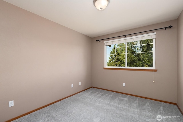 3706 54th St E, Tacoma, WA 98443 - empty room featuring baseboards and light carpet