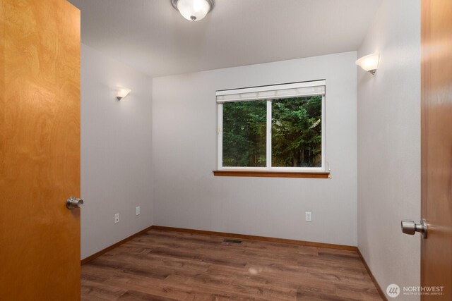 3706 54th St E, Tacoma, WA 98443 - spare room with wood finished floors and baseboards