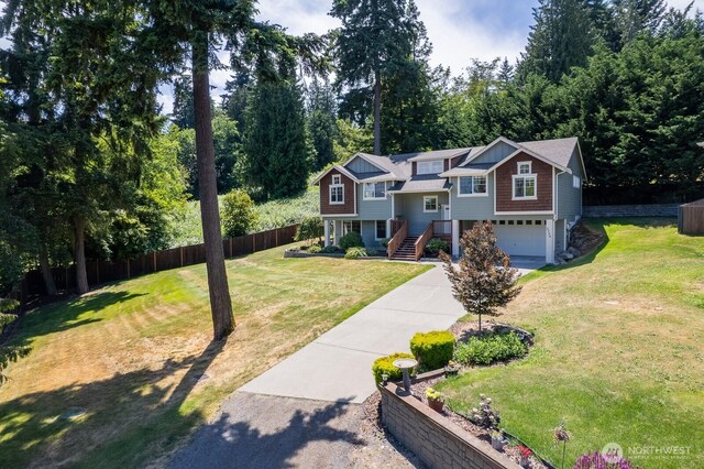 3706 54th St E, Tacoma, WA 98443 - split foyer home featuring an attached garage and concrete driveway