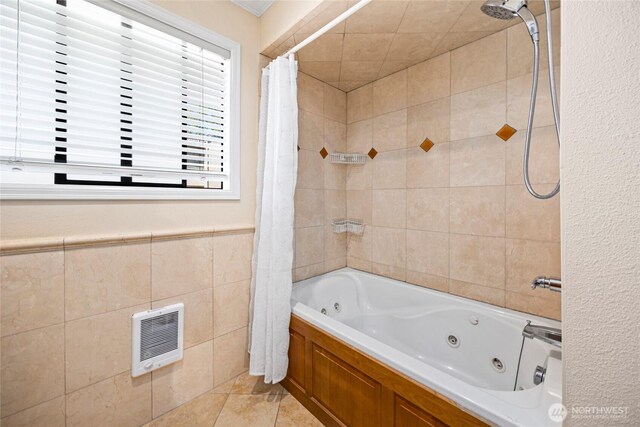 826 Lake St S, Kirkland, WA 98033 - full bath featuring heating unit, tile walls, a combined bath / shower with jetted tub, and tile patterned flooring