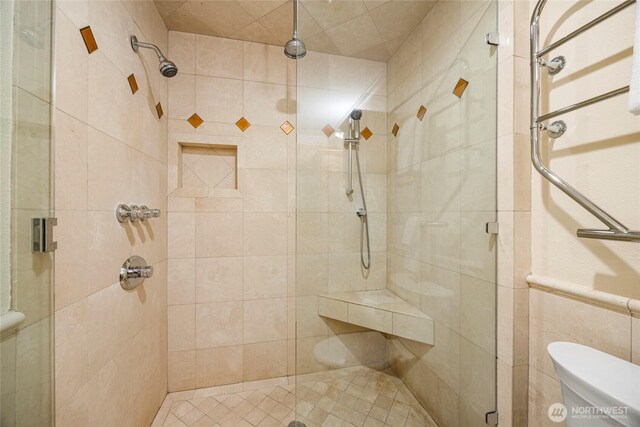 826 Lake St S, Kirkland, WA 98033 - bathroom with a stall shower and tile walls