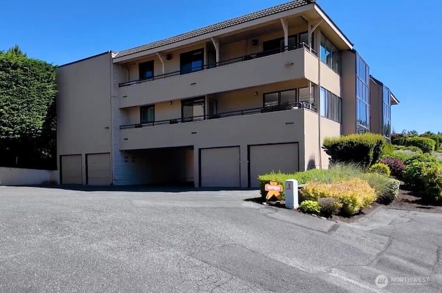 826 Lake St S, Kirkland, WA 98033 - view of building exterior with an attached garage