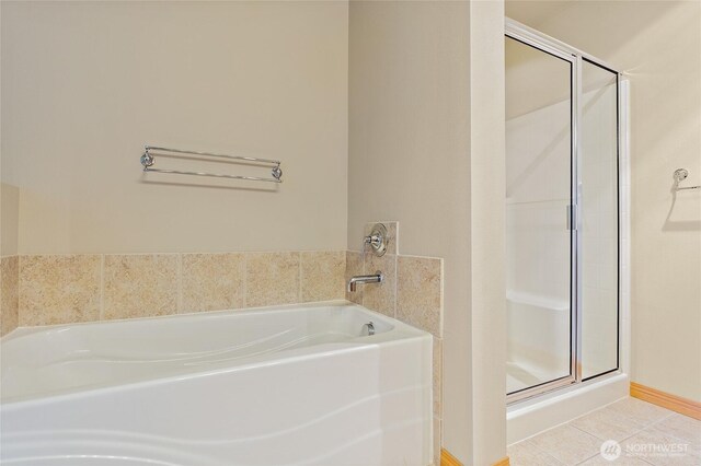 3031 Belmonte Ln, Everett, WA 98201 - full bathroom featuring a bath, a stall shower, and tile patterned flooring