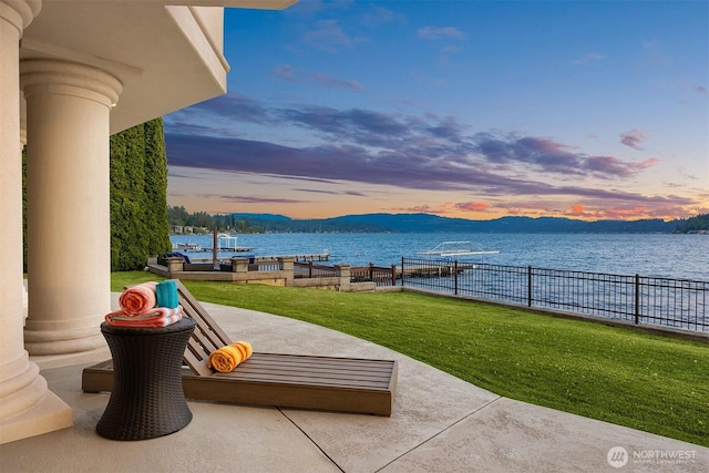 2819 E Lake Sammamish Pkwy NE, Sammamish, WA 98074 - patio terrace at dusk featuring a water view and a patio area