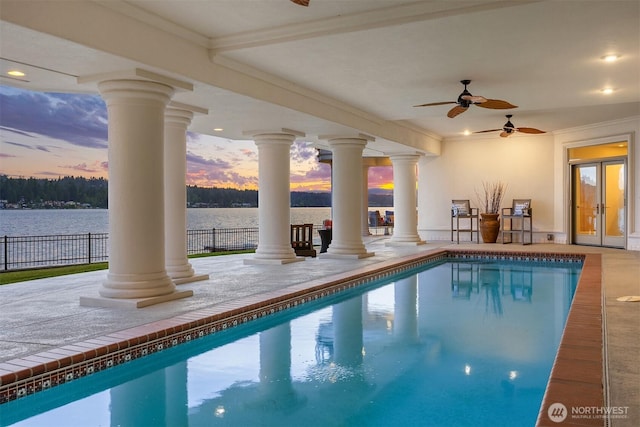 2819 E Lake Sammamish Pkwy NE, Sammamish, WA 98074 - view of pool with french doors, a water view, a ceiling fan, and a patio