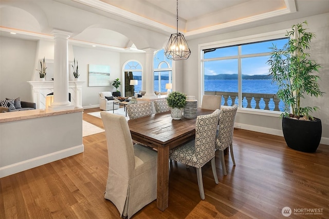 2819 E Lake Sammamish Pkwy NE, Sammamish, WA 98074 - dining area with ornate columns, a tray ceiling, wood finished floors, and recessed lighting