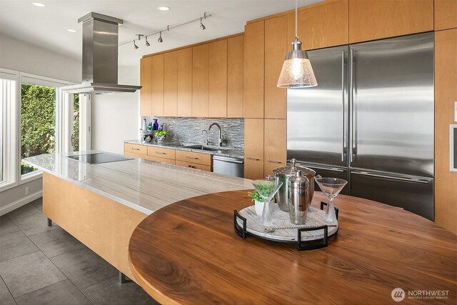 2819 E Lake Sammamish Pkwy NE, Sammamish, WA 98074 - kitchen featuring appliances with stainless steel finishes, island range hood, backsplash, tile patterned floors, and modern cabinets