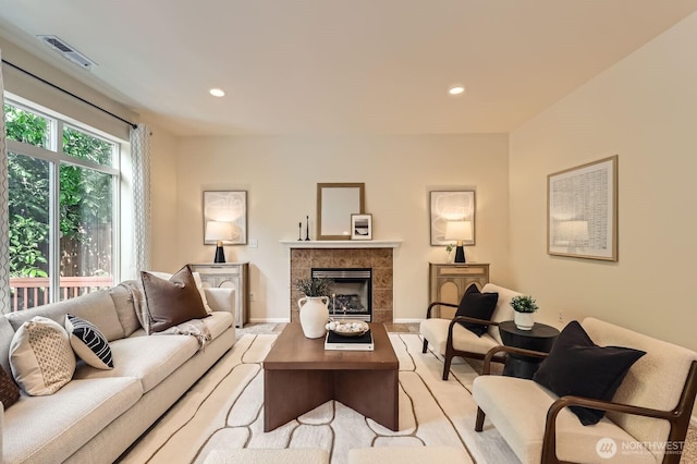 4015 134th Pl SE, Mill Creek, WA 98012 - living area featuring a tiled fireplace and recessed lighting
