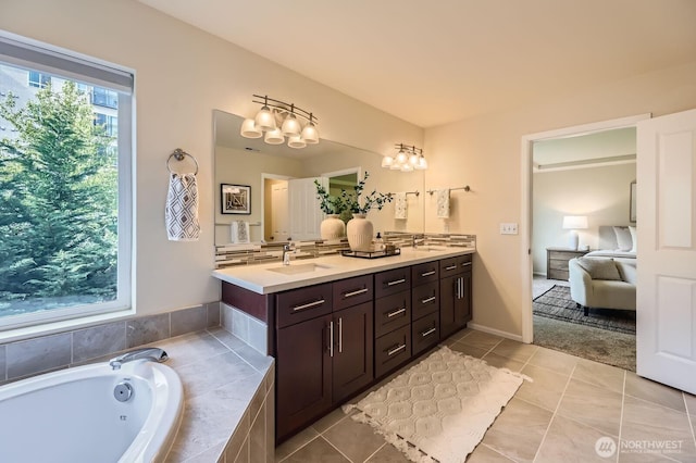 4015 134th Pl SE, Mill Creek, WA 98012 - ensuite bathroom with double vanity, a tub with jets, and tile patterned flooring
