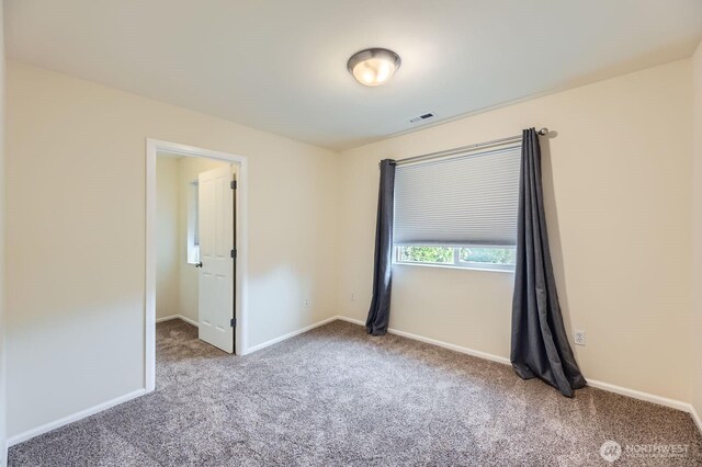 4015 134th Pl SE, Mill Creek, WA 98012 - carpeted empty room featuring baseboards