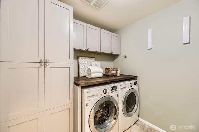 4015 134th Pl SE, Mill Creek, WA 98012 - laundry area with washing machine and clothes dryer and cabinet space