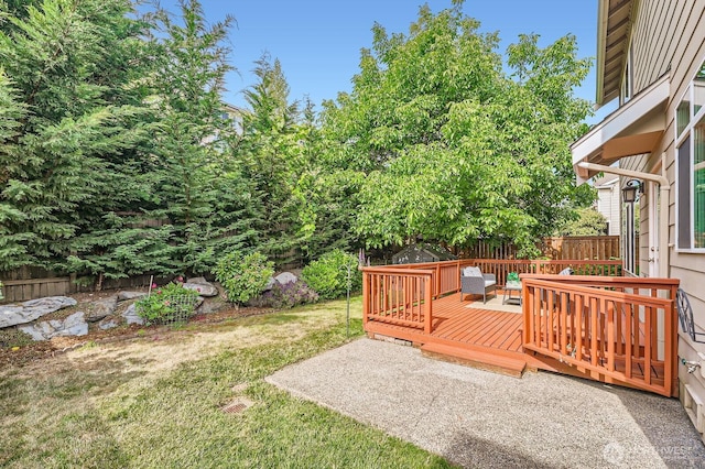 4015 134th Pl SE, Mill Creek, WA 98012 - fenced backyard with a wooden deck