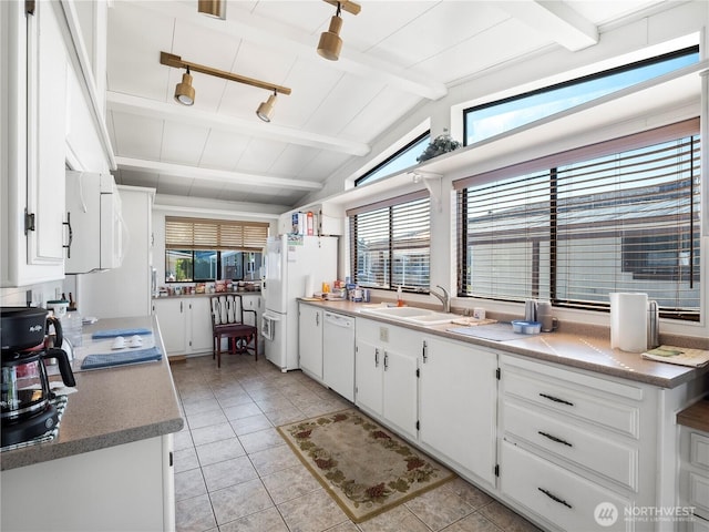 11436 SE 208th St Unit 45, Kent, WA 98031 - kitchen with white appliances, light tile patterned floors, white cabinetry, and healthy amount of natural light