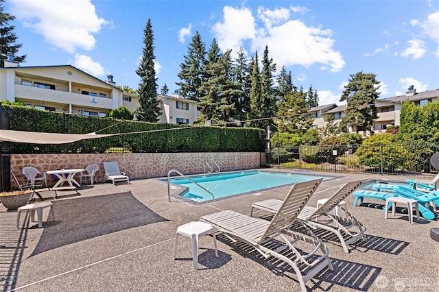 12906 8th Ave W Unit C102, Everett, WA 98204 - community pool featuring a patio and a residential view