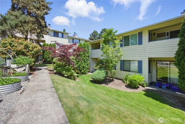 12906 8th Ave W Unit C102, Everett, WA 98204 - view of community featuring a lawn