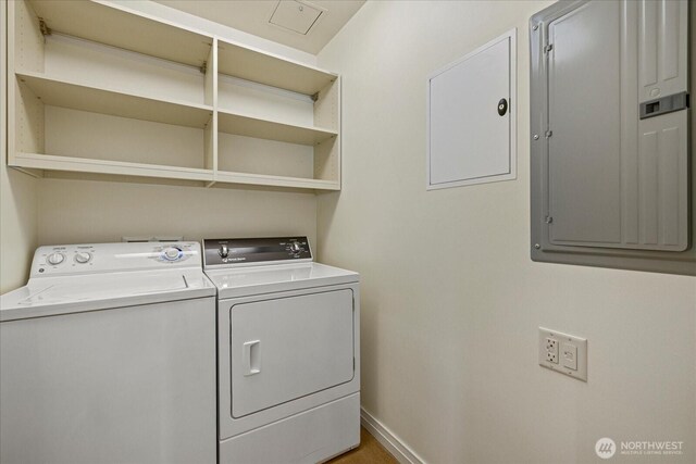 10700 NE 4th St Unit 712, Bellevue, WA 98004 - washroom featuring electric panel and washing machine and dryer