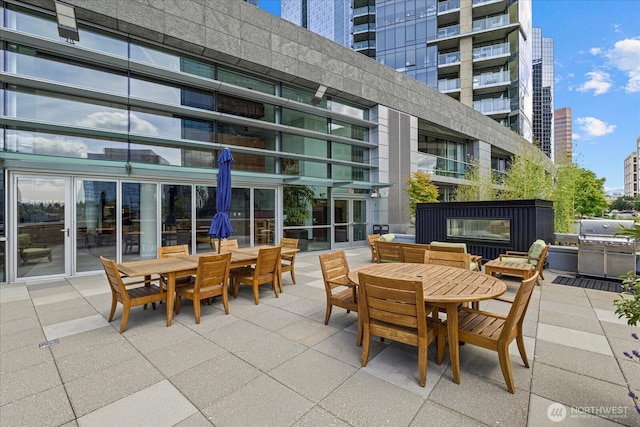 10700 NE 4th St Unit 712, Bellevue, WA 98004 - view of patio with outdoor dining space and grilling area