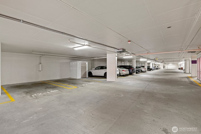 10700 NE 4th St Unit 712, Bellevue, WA 98004 - parking garage featuring a garage door opener
