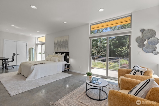 1100 14th Ave, Seattle, WA 98122 - bedroom featuring concrete floors, access to exterior, multiple windows, and recessed lighting