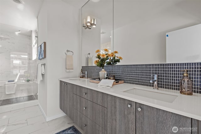1100 14th Ave, Seattle, WA 98122 - bathroom featuring marble look tiles, double vanity, a shower stall, and backsplash