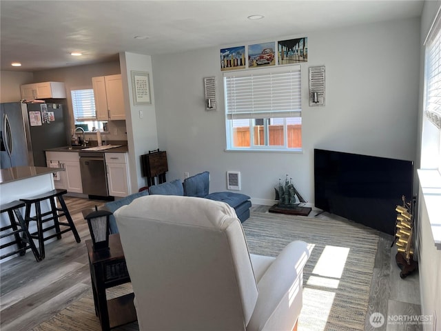 916 35th St, Anacortes, WA 98221 - living room with light wood-style flooring and recessed lighting