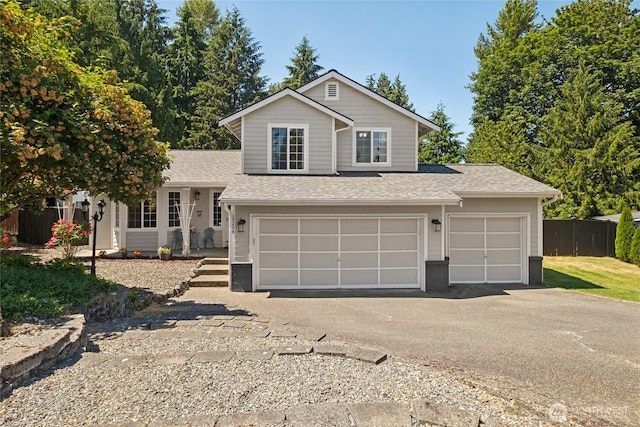 19204 112th St E, Bonney Lake, WA 98391 - split level home featuring driveway, a garage, and roof with shingles