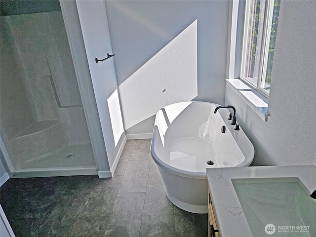 119 Davis View Dr, Centralia, WA 98531 - full bathroom with a soaking tub, a walk in shower, tile patterned floors, and vanity