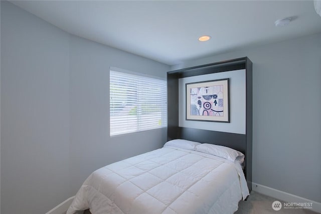 2067 Gilman Dr W, Seattle, WA 98119 - carpeted bedroom featuring baseboards and recessed lighting