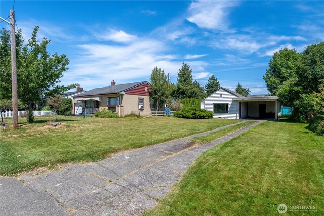 3032 Tulip Rd, Bellingham, WA 98225 - view of front facade featuring driveway, a chimney, and a carport