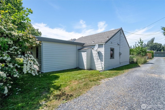 3032 Tulip Rd, Bellingham, WA 98225 - back of property with gravel driveway and a shingled roof