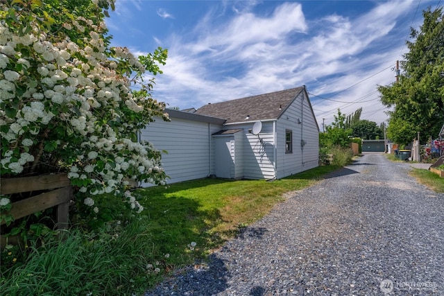 3032 Tulip Rd, Bellingham, WA 98225 - view of home's exterior with a shingled roof and driveway