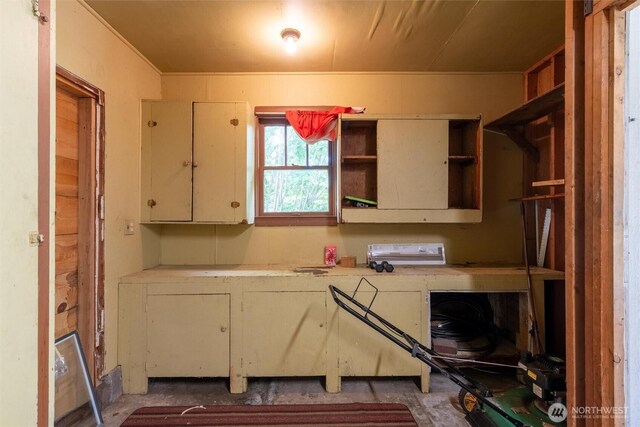 3032 Tulip Rd, Bellingham, WA 98225 - kitchen with open shelves, light countertops, and cream cabinetry