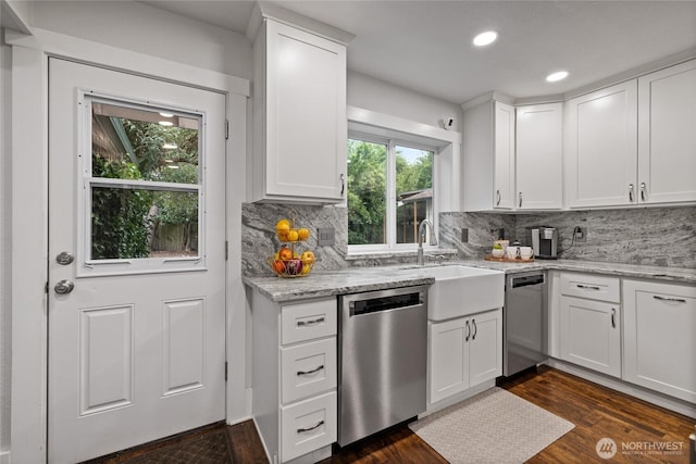8213 S Fawcett Ave, Tacoma, WA 98408 - kitchen featuring stainless steel dishwasher, dark wood finished floors, decorative backsplash, white cabinets, and recessed lighting