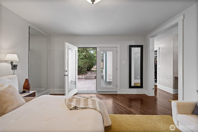 8213 S Fawcett Ave, Tacoma, WA 98408 - bedroom with access to outside and wood finished floors