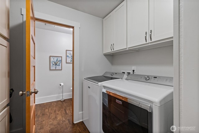 8213 S Fawcett Ave, Tacoma, WA 98408 - laundry room featuring washer and dryer, cabinet space, and dark wood finished floors