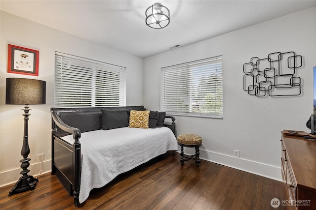 8213 S Fawcett Ave, Tacoma, WA 98408 - bedroom featuring dark wood-type flooring and baseboards
