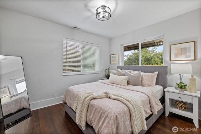8213 S Fawcett Ave, Tacoma, WA 98408 - bedroom with wood finished floors and baseboards